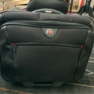 Wenger carry on luggage with wheels. Very good used condition